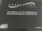 Lot Of 6 Transition Networks J/E-PSW-FX-01 10/100 100FX Fiber Media Converter New. Price: $29.95.