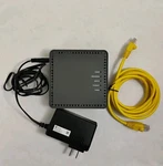 Calix Gigapoint GP1100X Model No. 100-05463 W/ Power Supply & Ethernet Cable Used. Price: $42.46.